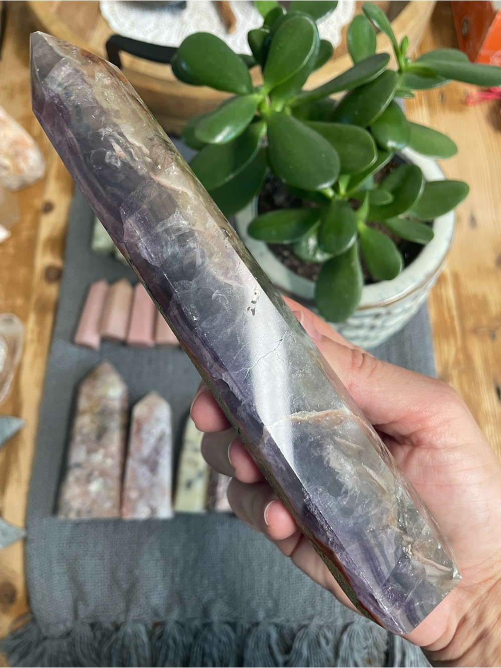 Massive banded fluorite tower with inclusions and natural spot